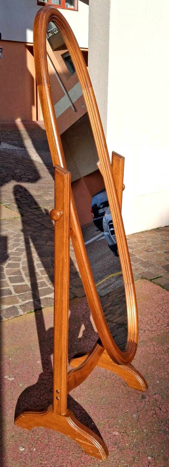 Adjustable full-length mirror for dressing room.