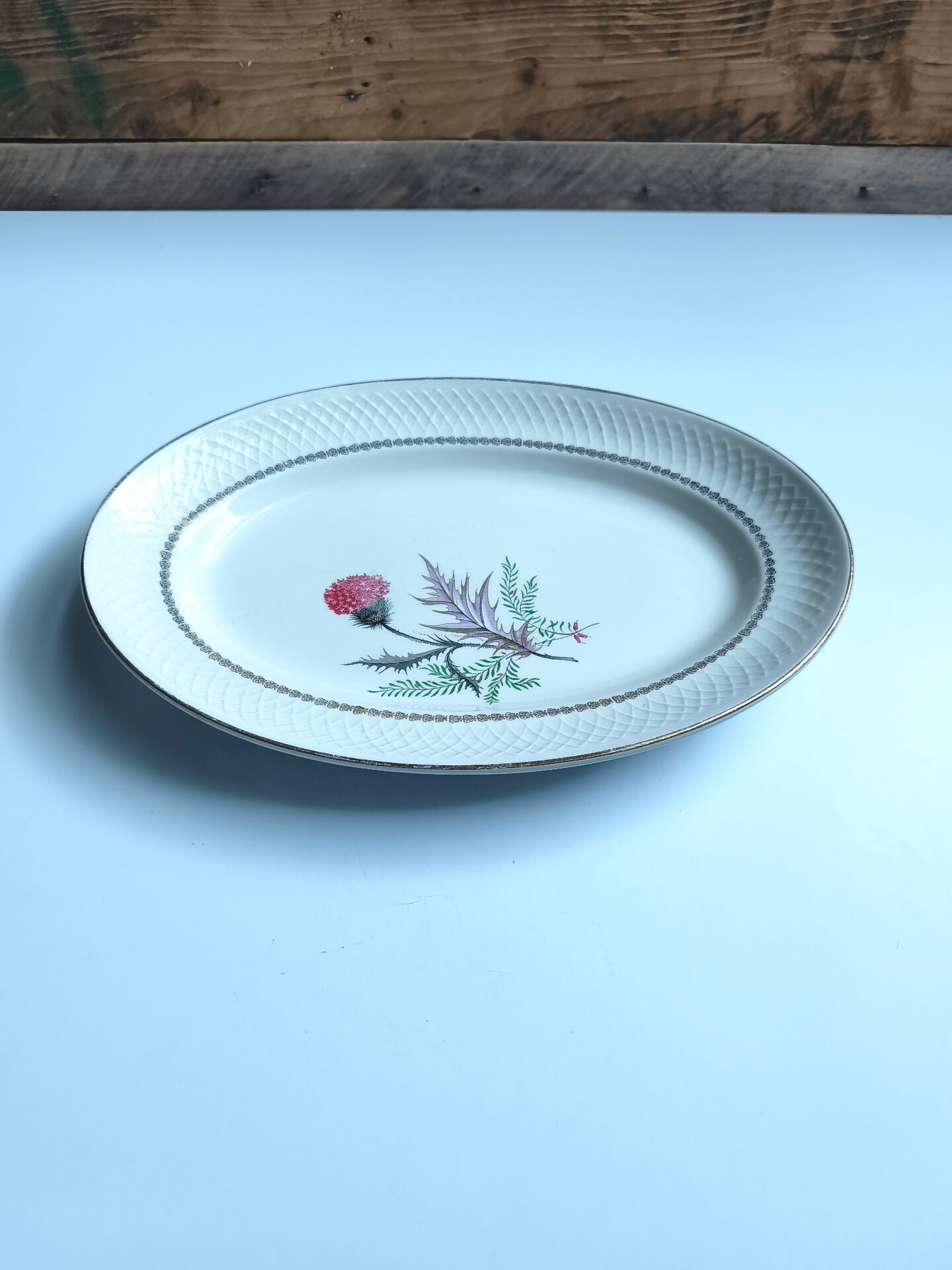 Vintage oval plate signed Moulin des Loups model Imperia pink flower