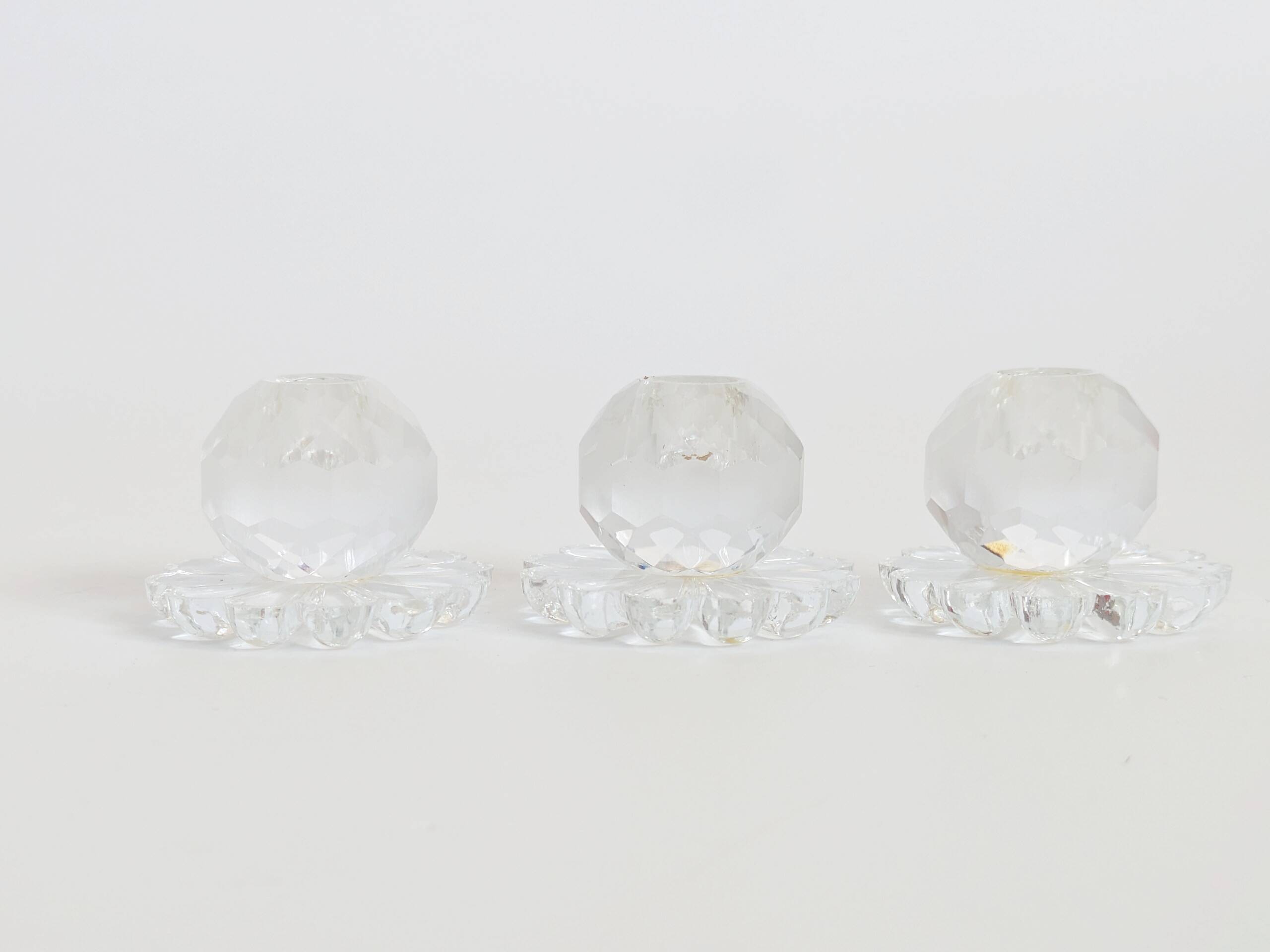 Lot of 3 vintage faceted crystal candle holders with flower base for slim candles.