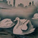Plate of earthenware dabbling in swans