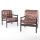 Paire de fauteuils en cuir