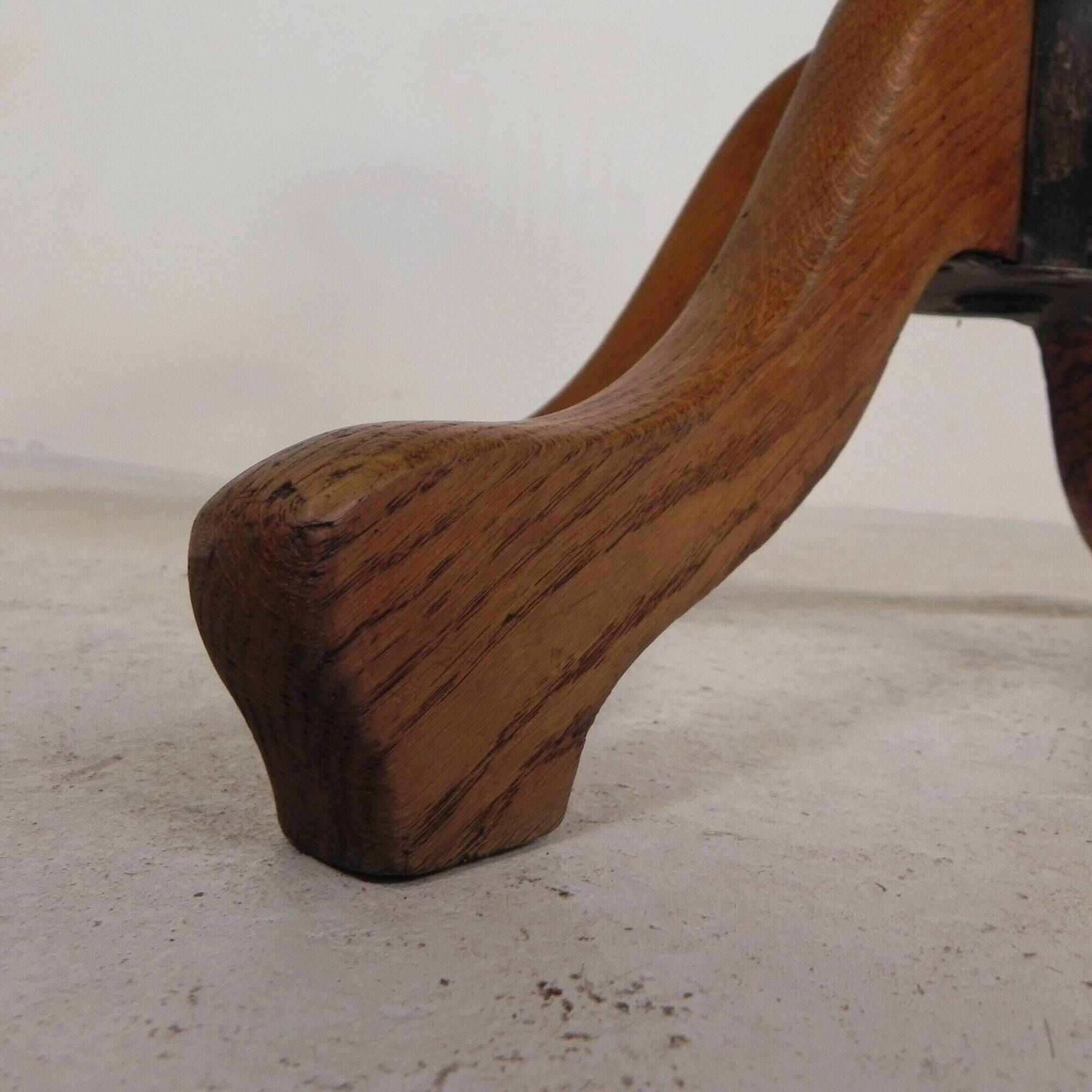 Oak office chair with adjustable spring system and height adjustment, 1950s.