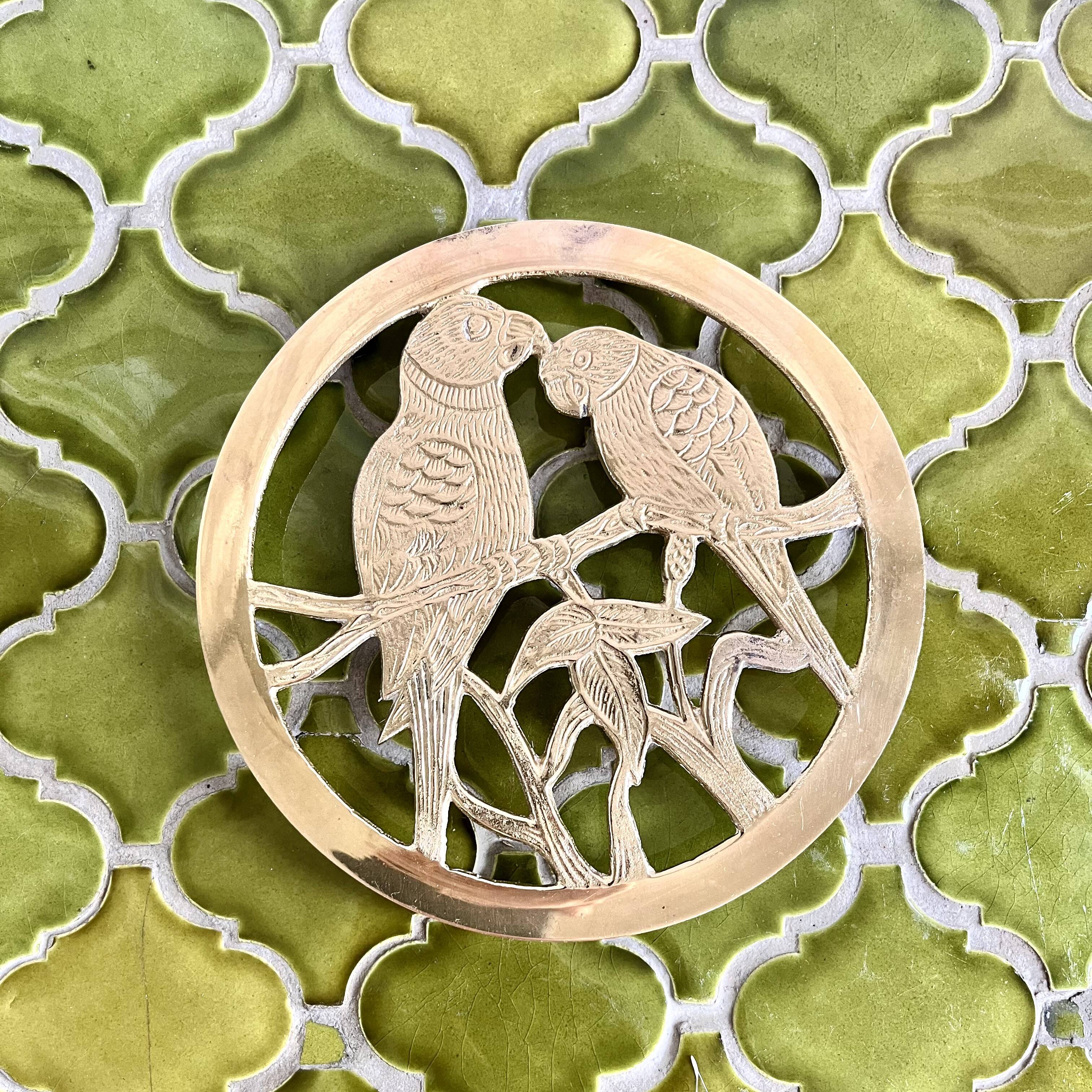 Small brass trivet with parrots or inseparable birds