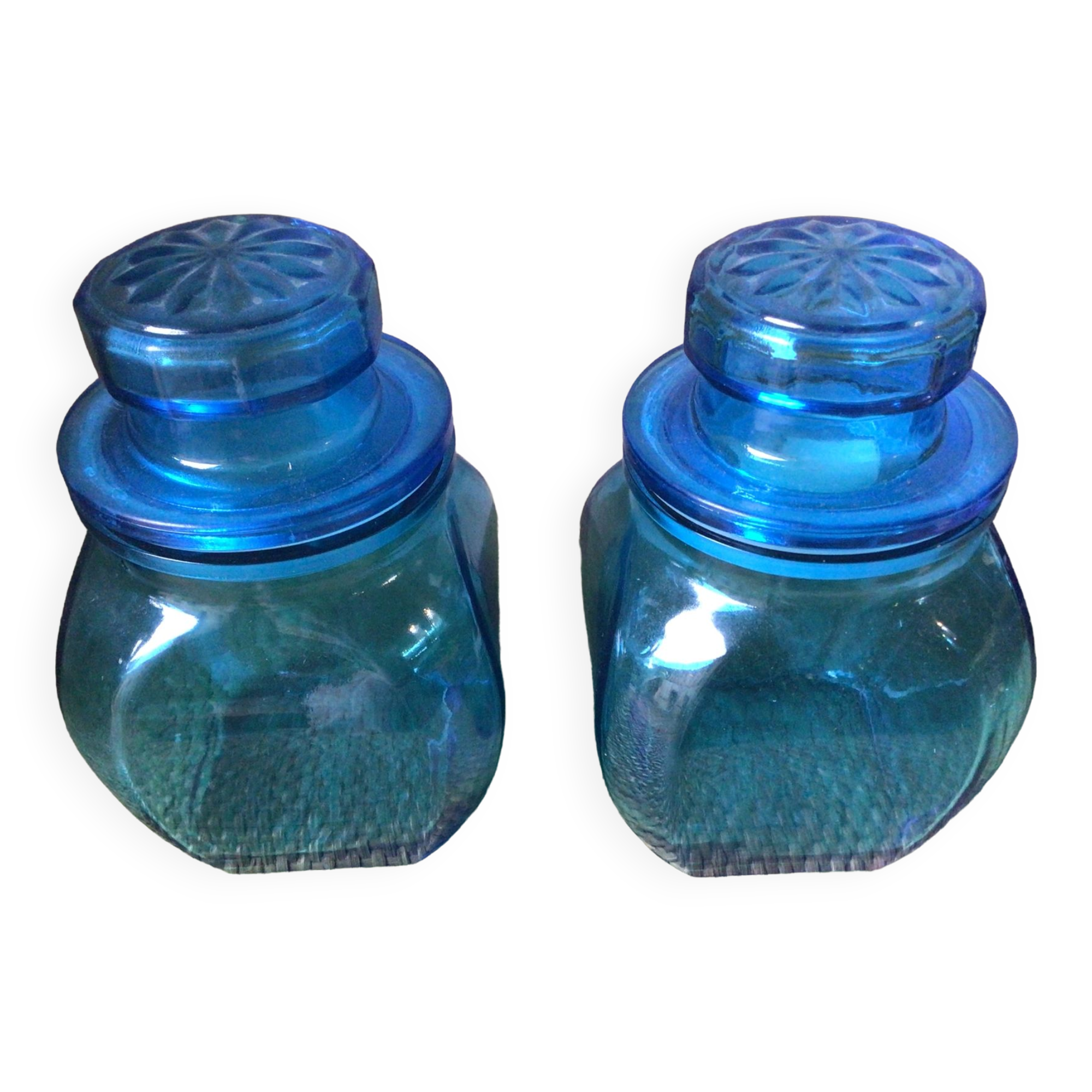 2 blue glass jars