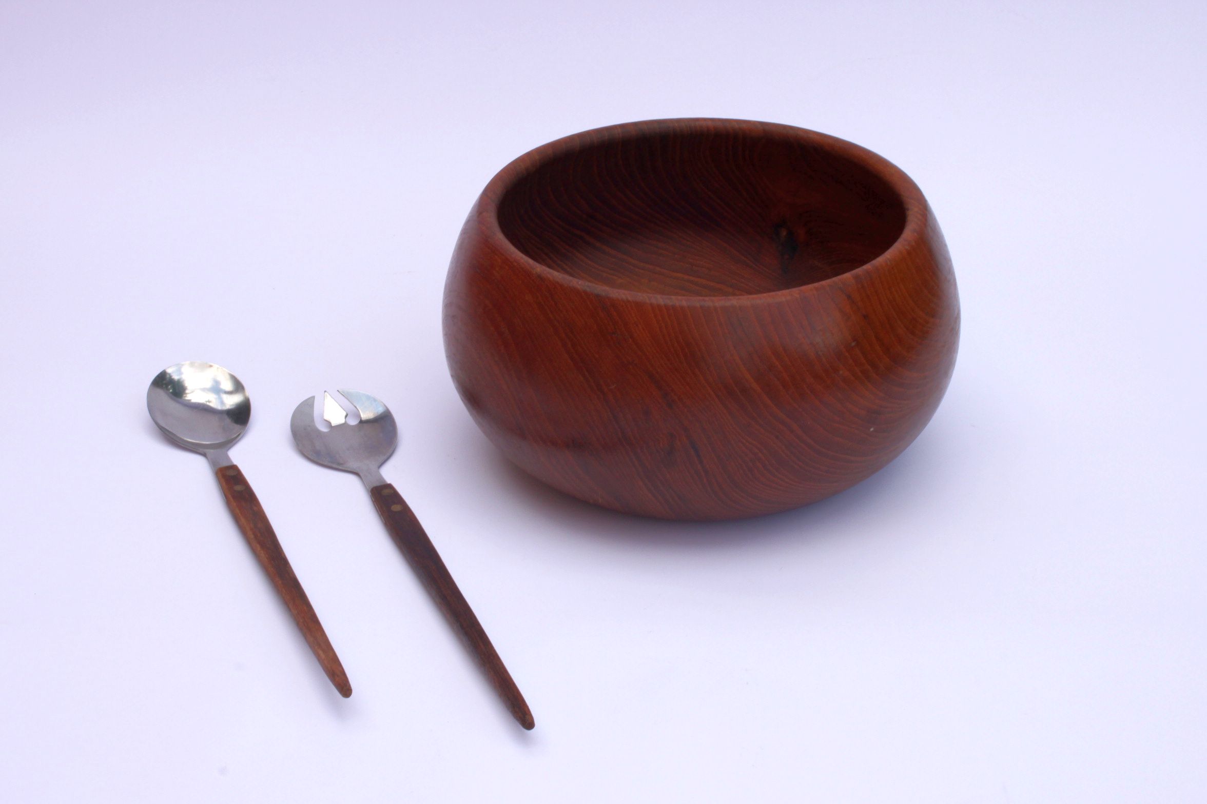 Teak wooden salad bowl and serving spoons, 1970s