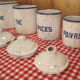 6 old spice pots in white and blue enamelled sheet metal