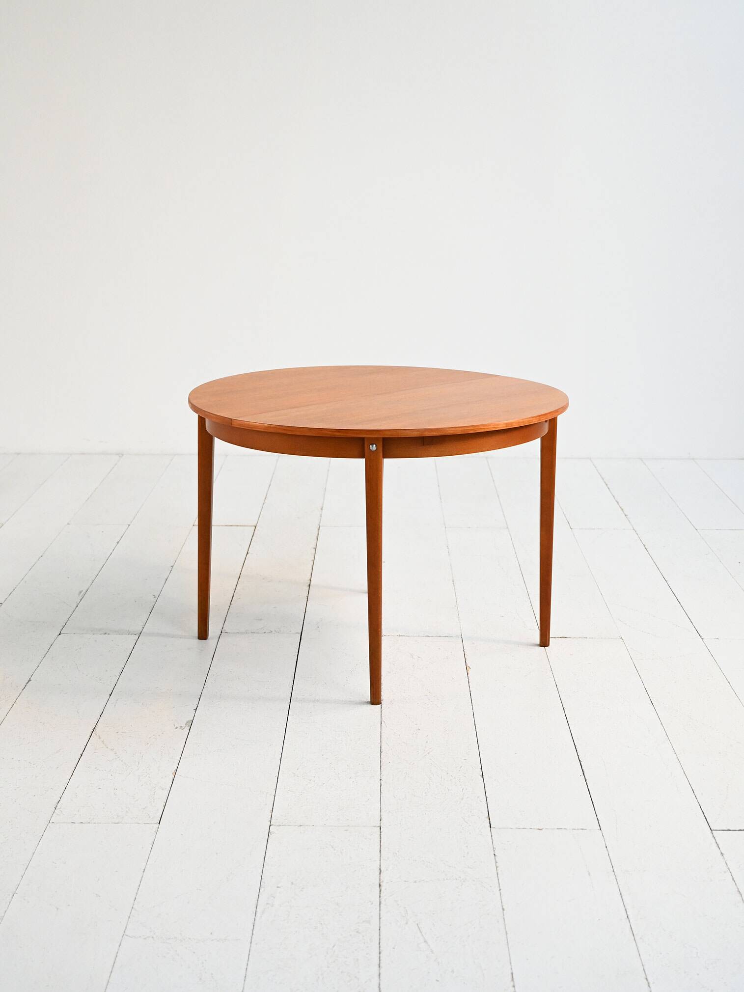Scandinavian round extendable teak table 1960s