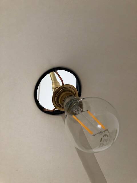 1950 floor lamp rises downwards in diabolo brass