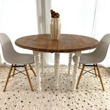 Extendable round table in raw and white wood