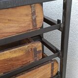 Black metal storage cabinet with 60 wooden drawers