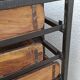Black metal storage cabinet with 60 wooden drawers