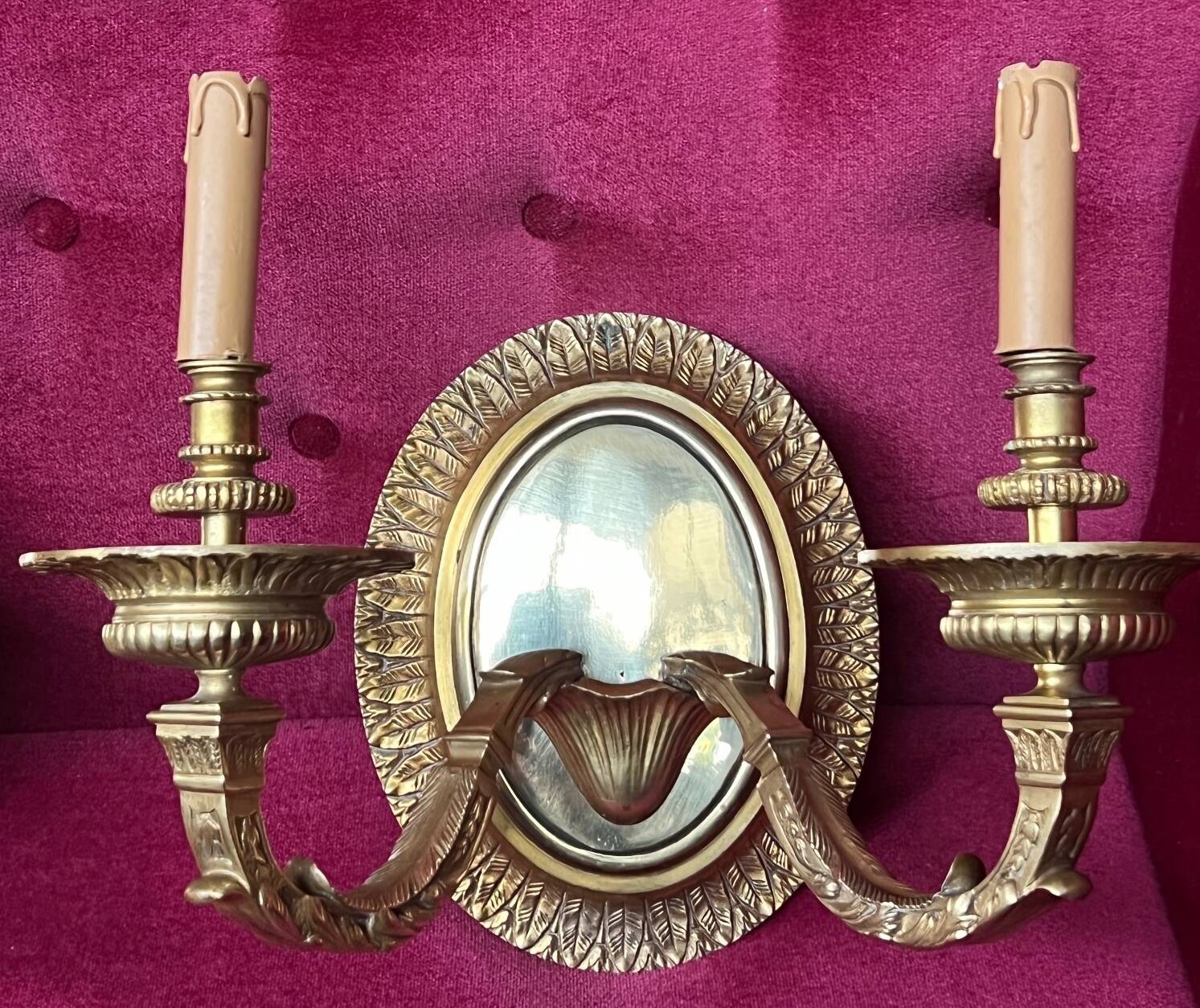 Pair of Louis XVI style solid gilded bronze wall sconces.