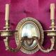 Pair of Louis XVI style solid gilded bronze wall sconces.