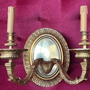 Pair of Louis XVI style solid gilded bronze wall sconces.