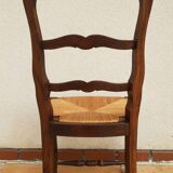 Regence chairs in straw-covered oak