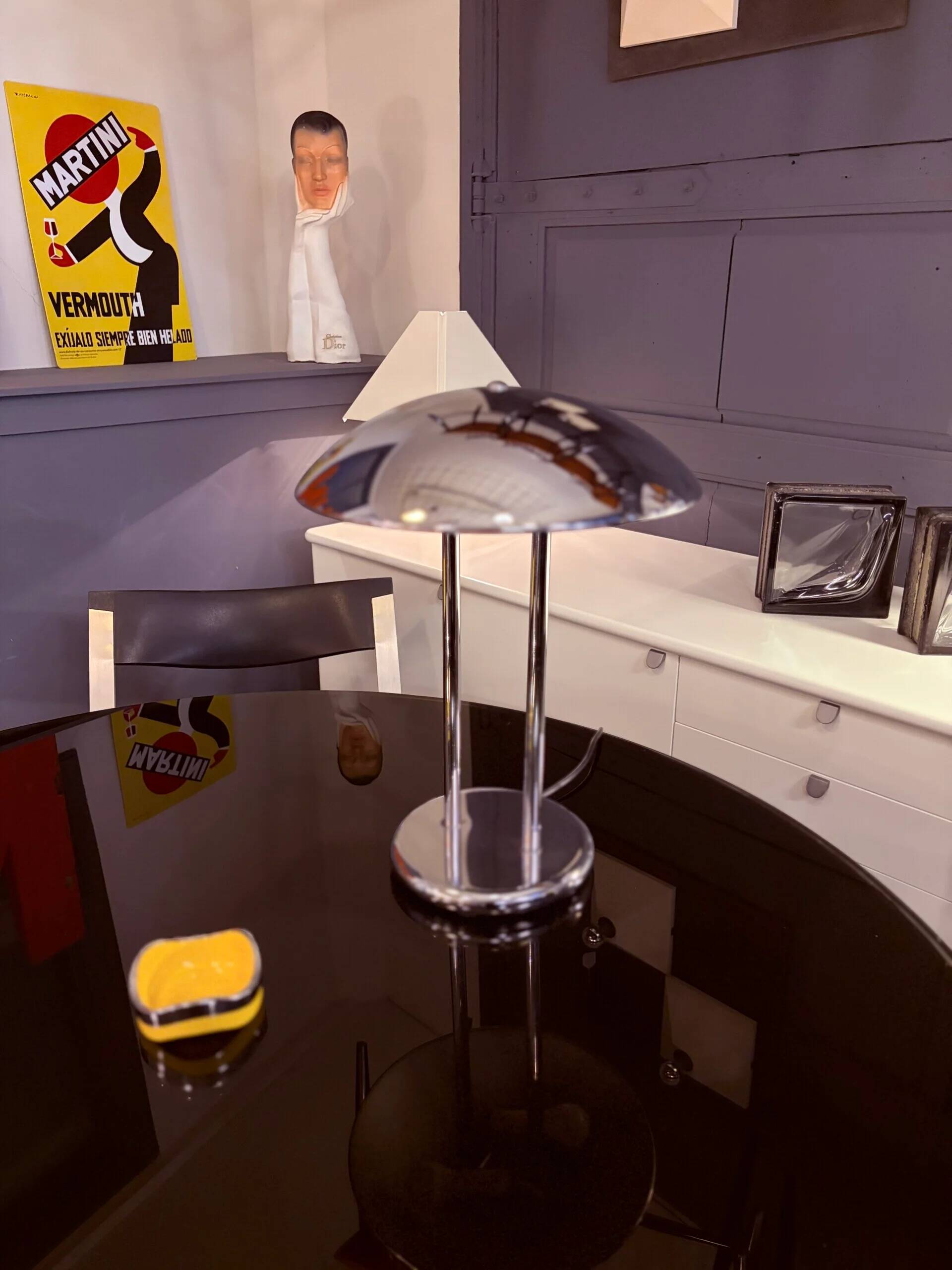 Round dining table, 1980s, black stained wood with glass top