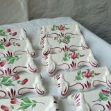 Suite of 18 knife holders in faience of luneville model reverbere