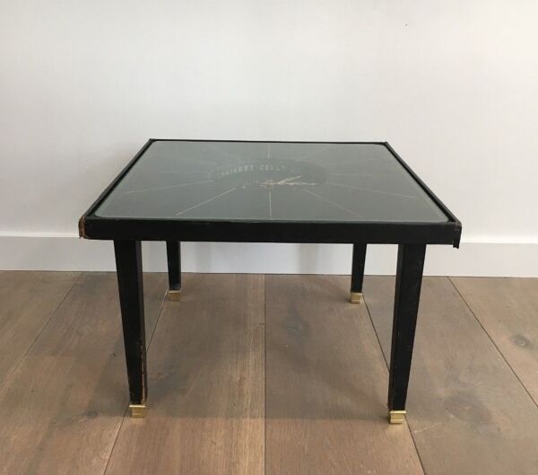 Table pendule en cuir et laiton. Dans le goût de Jacques Adnet