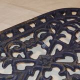 dessous de plat en fonte - ancien