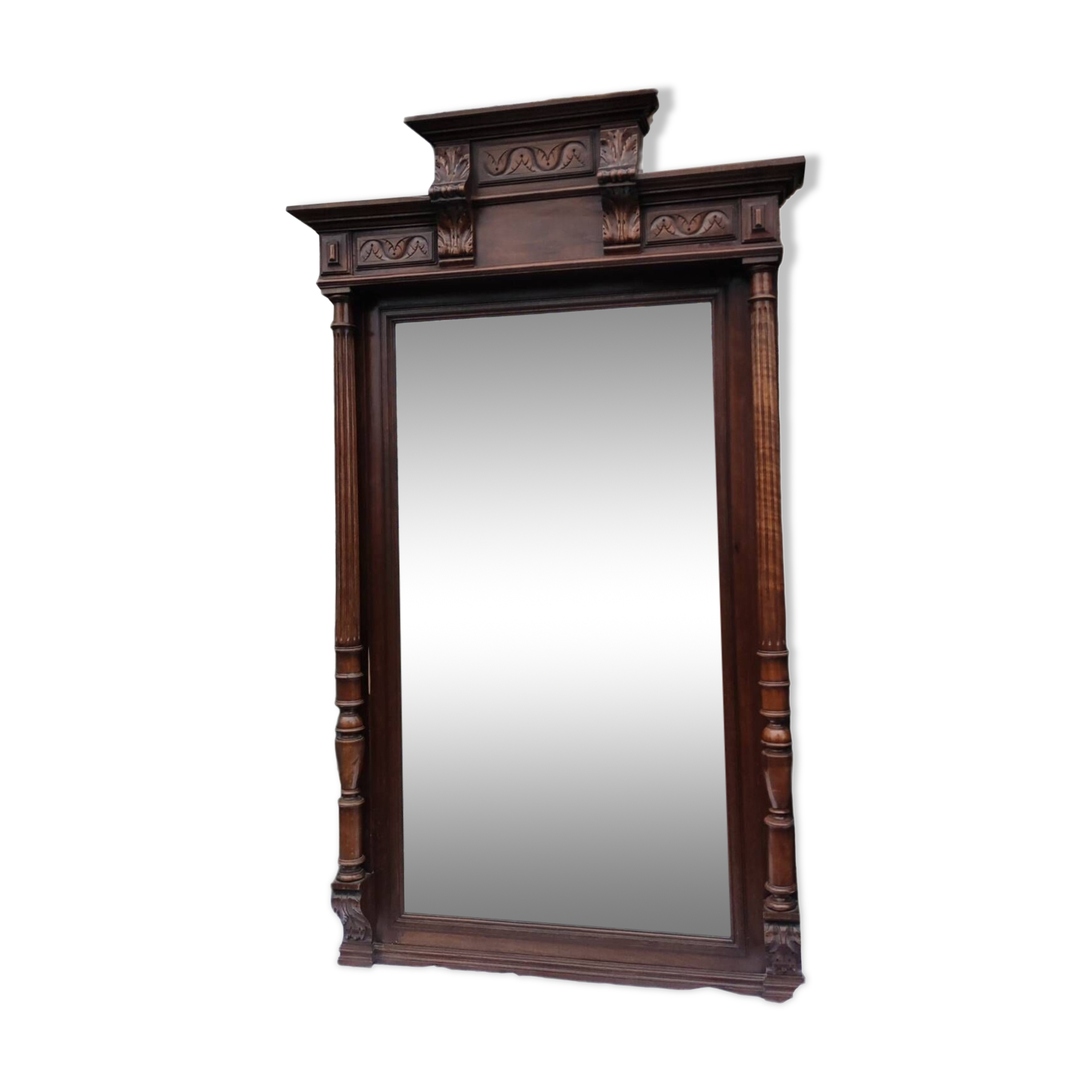 Old large carved wooden mirror