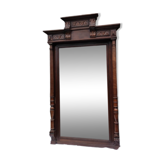 Old large carved wooden mirror