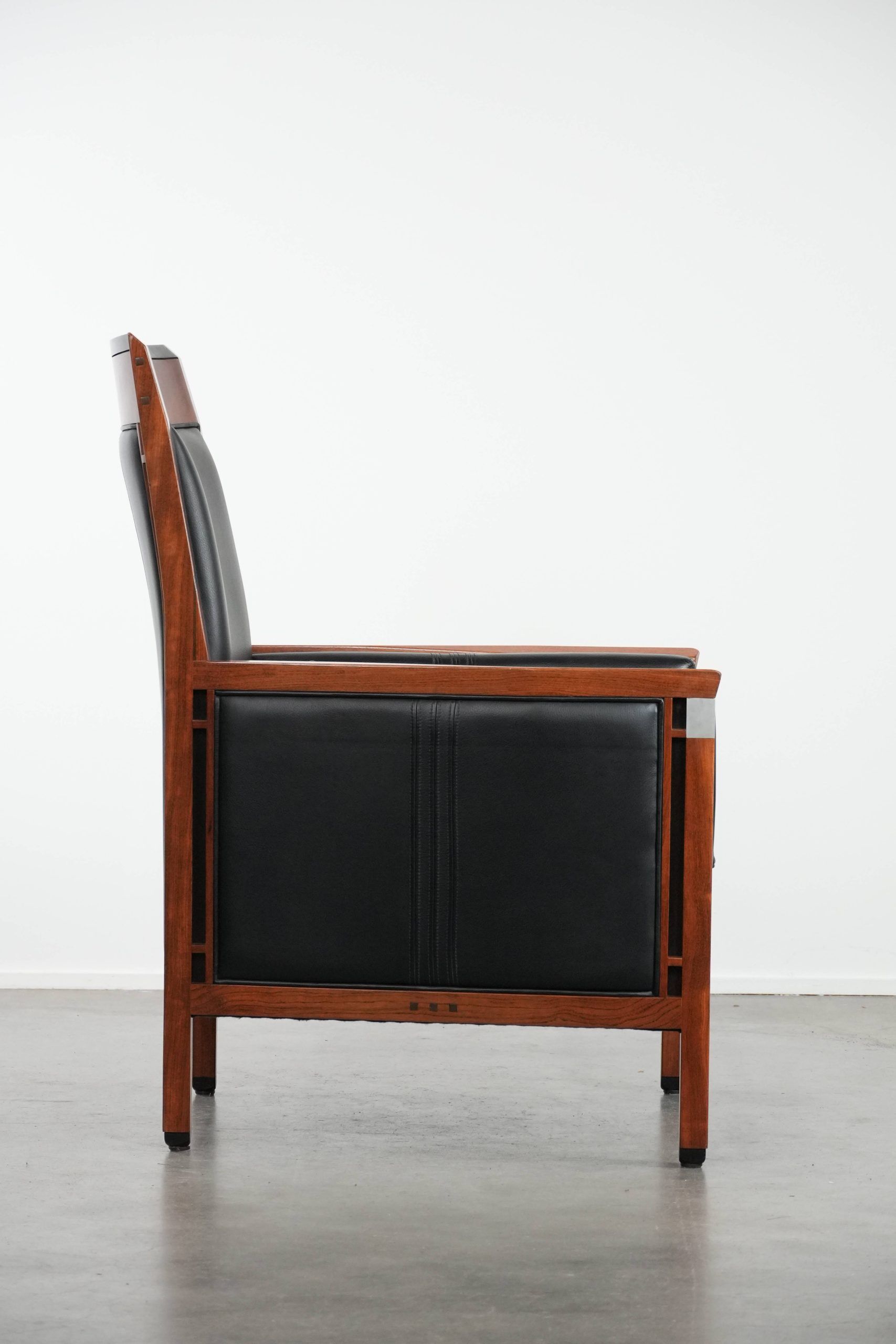 Beautiful and very comfortable black Art Deco design armchair