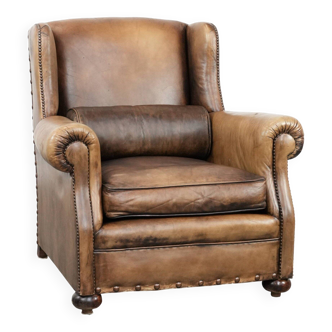 Luxury and large cowhide leather wingback chair in English style