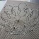 Fruit cut basket made of metal wire, ball feet