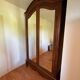 Glass-fronted lingerie wardrobe in solid wood