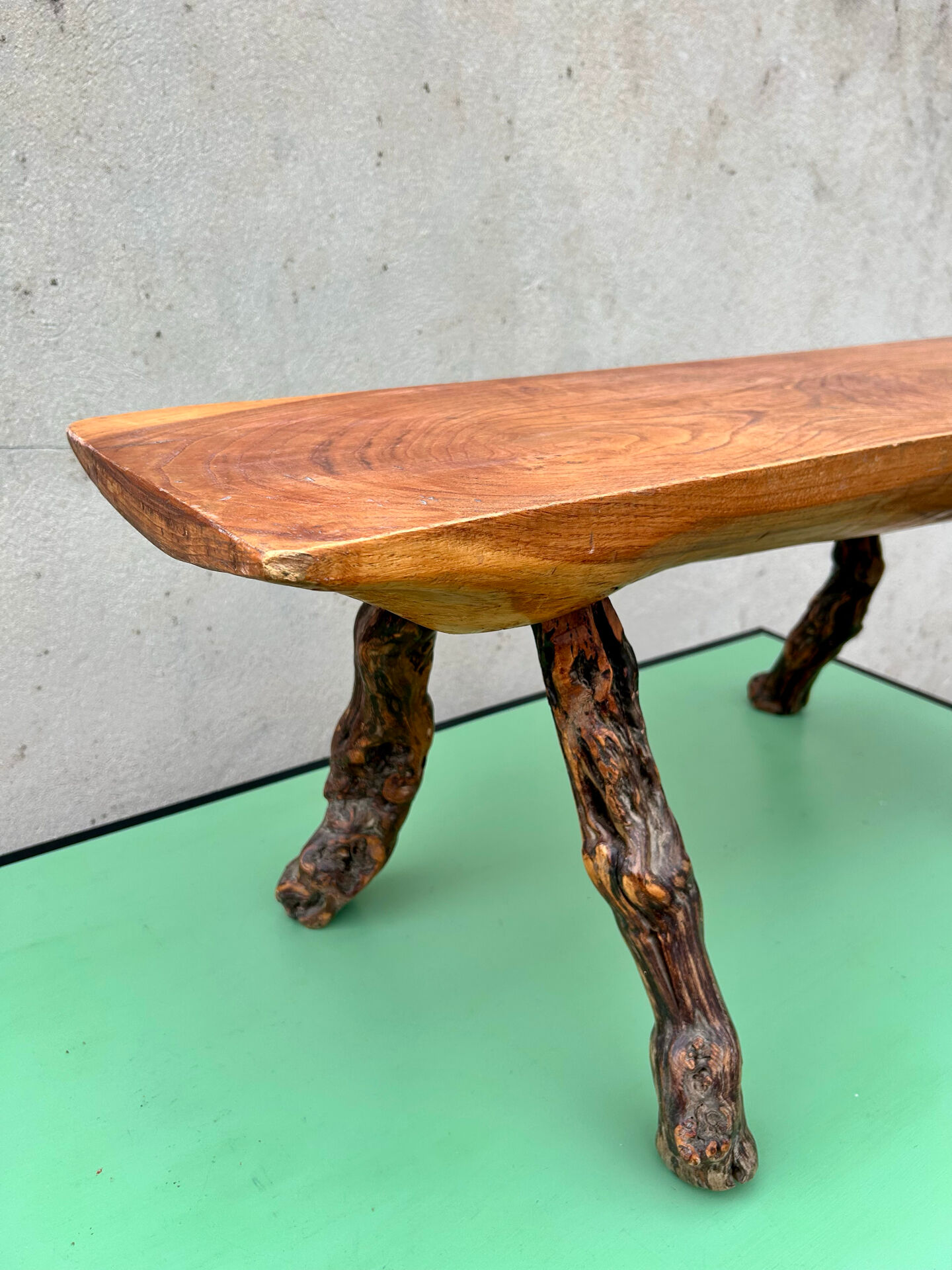 Brutalist bench made of vine and olive wood.