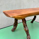 Brutalist bench made of vine and olive wood.