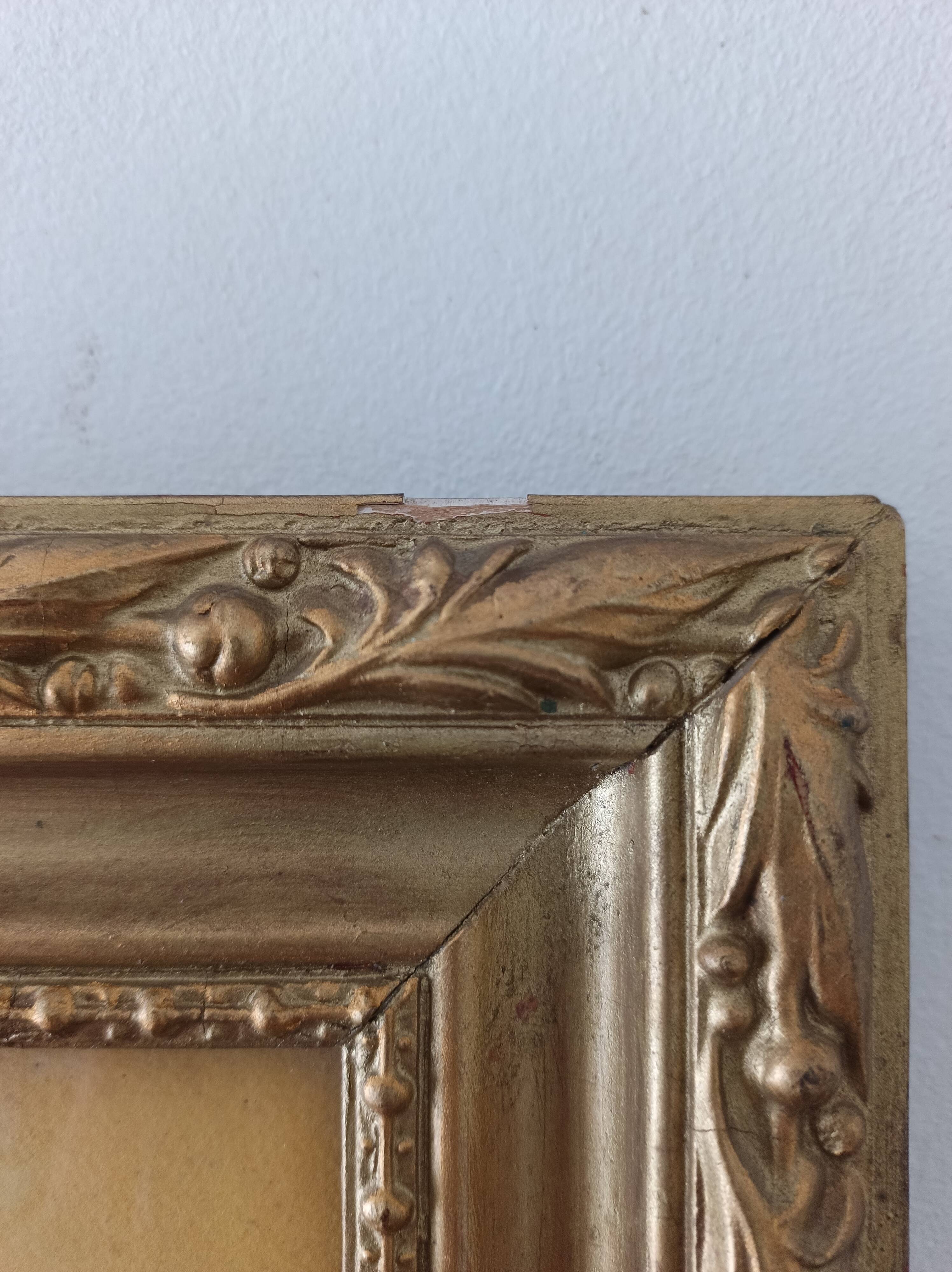 Painting framed under glass