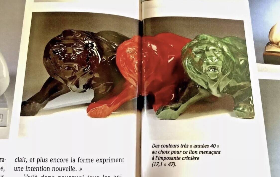 Art Deco lion statue 1930 cracked Saint Clément