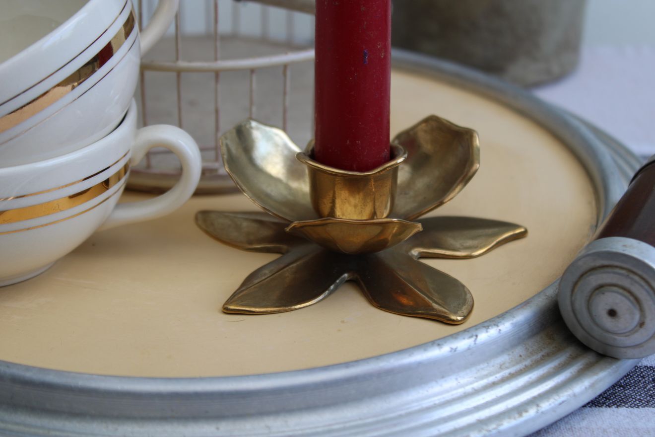 Golden brass candle holder