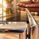 Vintage coffee table in chrome and smoked glass – 1970s/80s