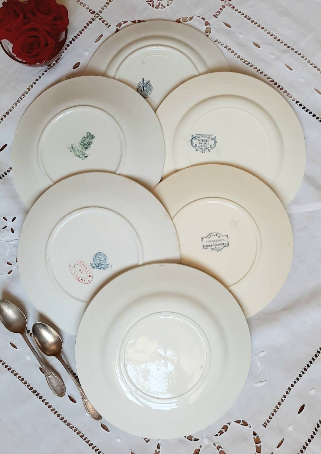 Old mismatched iron earthenware dessert plates accompanied by a dish
