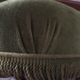 Old chair padded green velvet