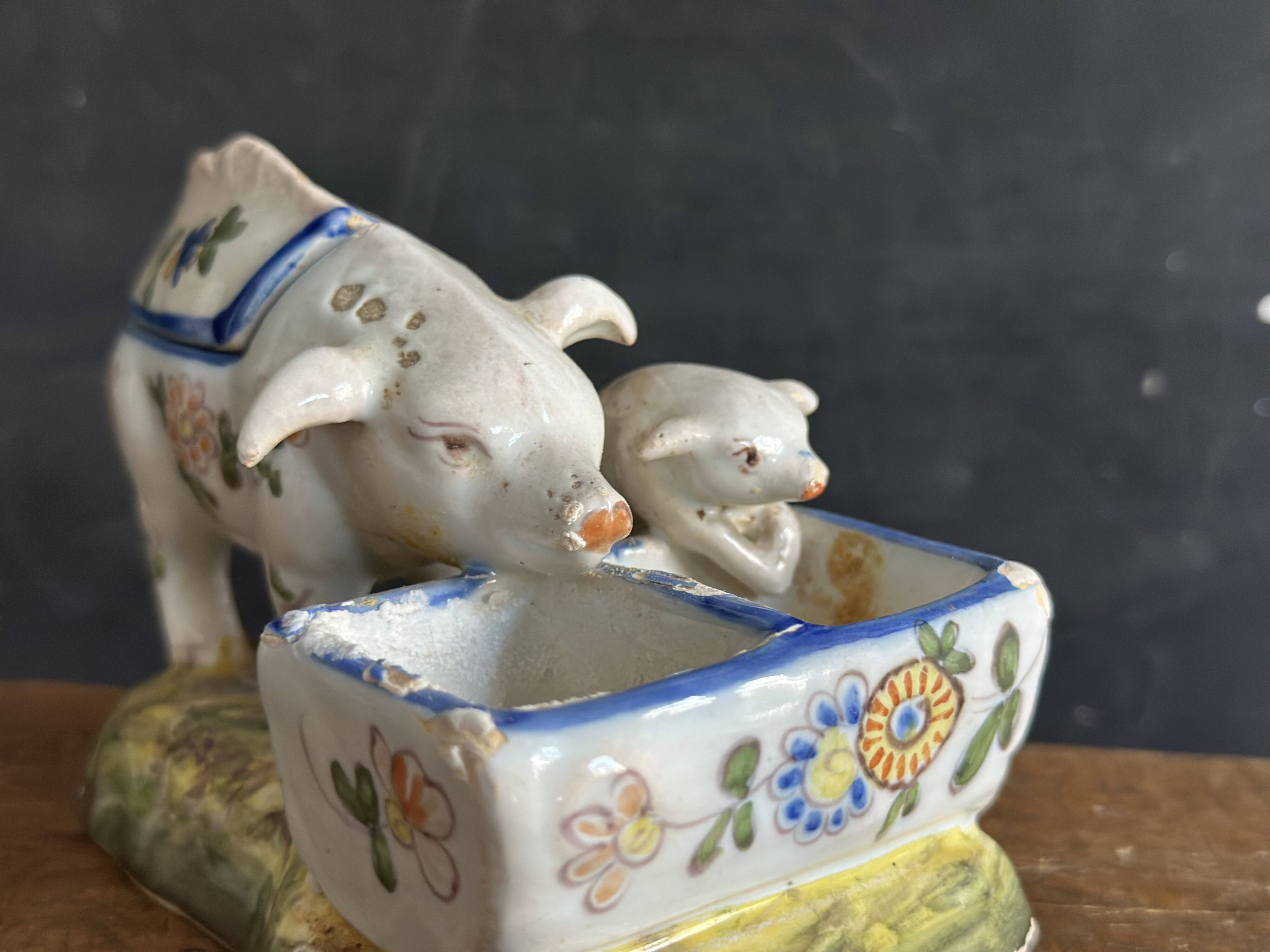Antique earthenware pig box, salt cellar or mustard pot, floral decoration.