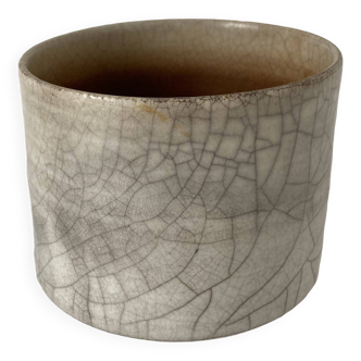 Traditional raku ceramic tea or matcha bowl with mark on the base