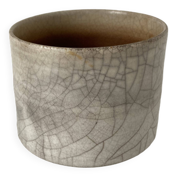 Traditional raku ceramic tea or matcha bowl with mark on the base