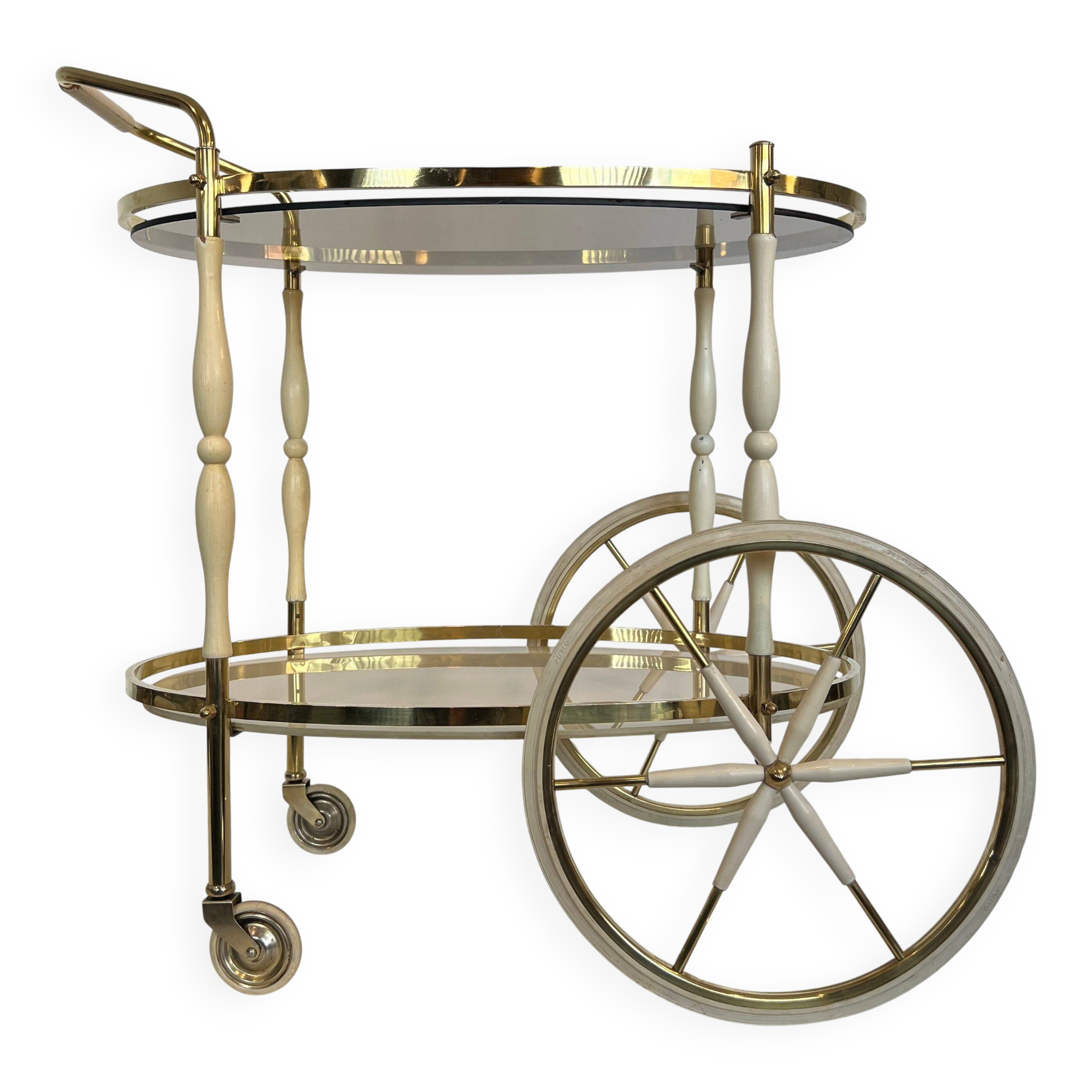 Italian oval rolling table in brass and lacquered wood.