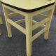 Pair of wooden and yellow formica chairs