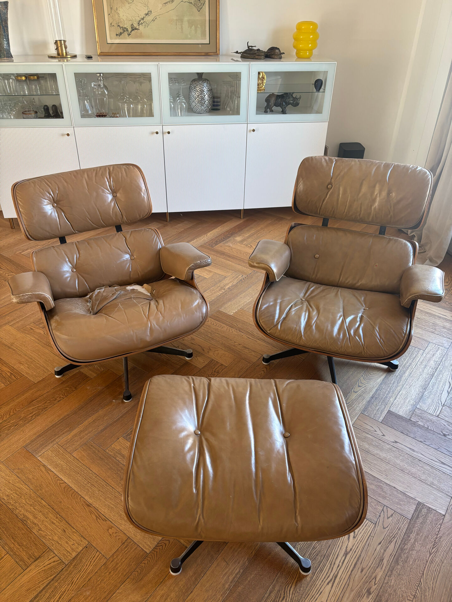 Armchairs and footrests by Charles & Ray Eames