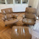 Armchairs and footrests by Charles & Ray Eames
