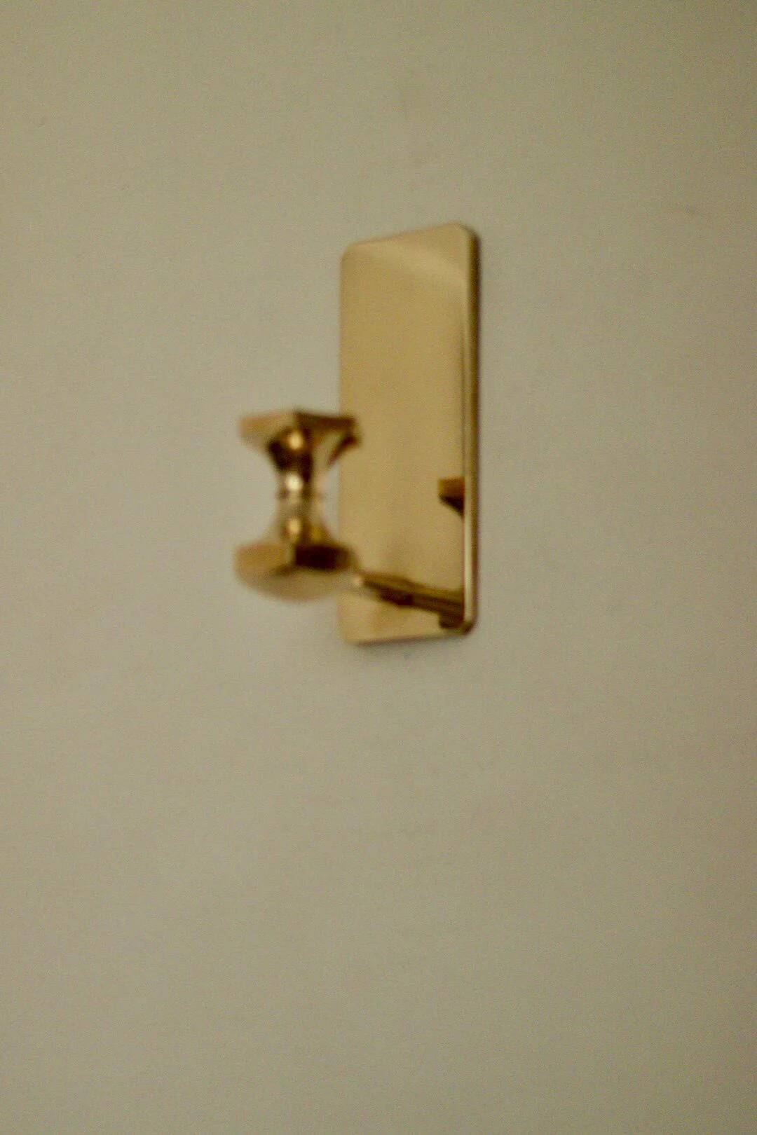 1988, single mid-century Swedish brass sconce by Gusum