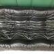 Black leather three seater sofa Togo by Ligne Roset