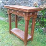 Art deco console in solid mahogany with diamond tips.