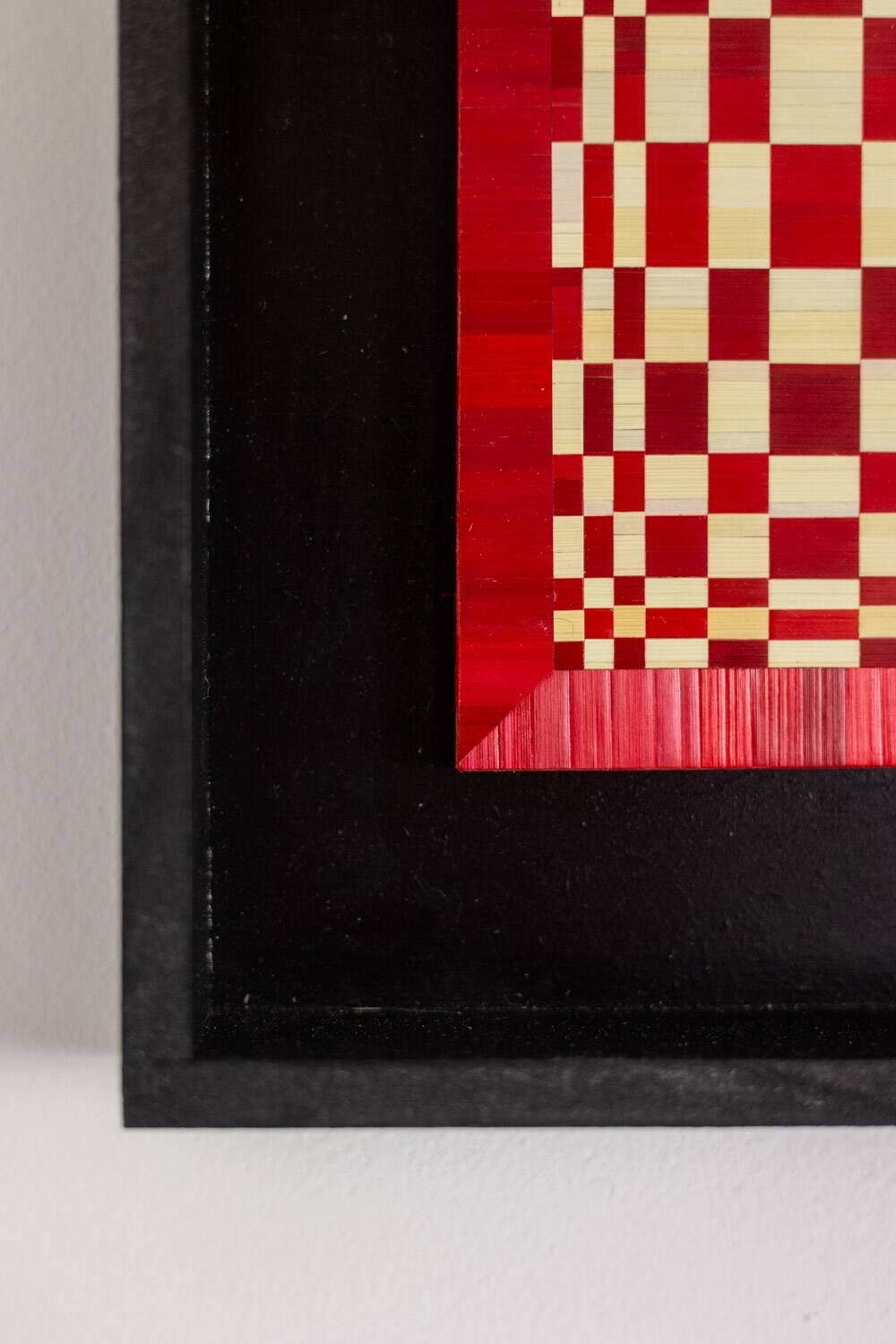 Pair of panels in red and gold straw marquetry. Contemporary.