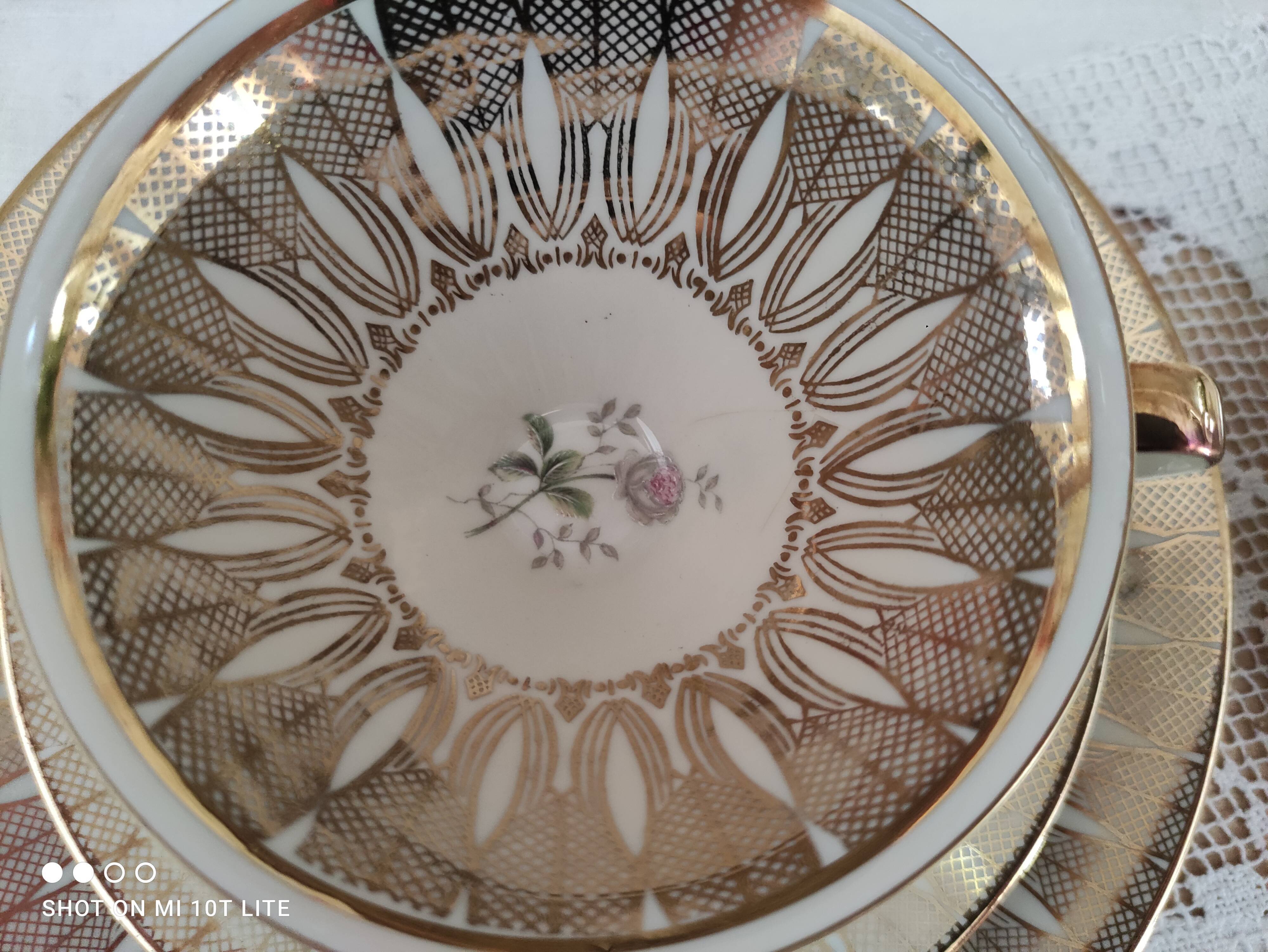 Head to head in porcelain Bavaria 6 pieces floral decoration and gilding