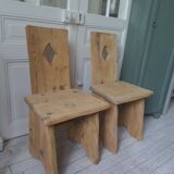 2 vintage chairs in brutalist style made of pitch pine with a waxed finish.